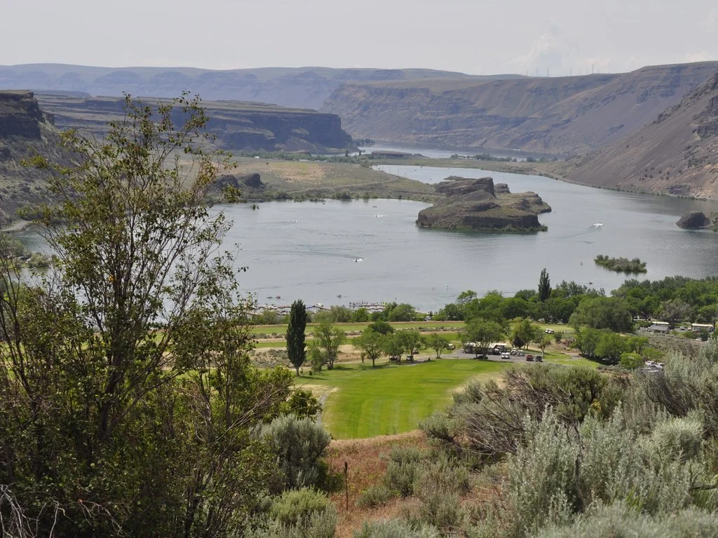 Golf course on the banks of park lake