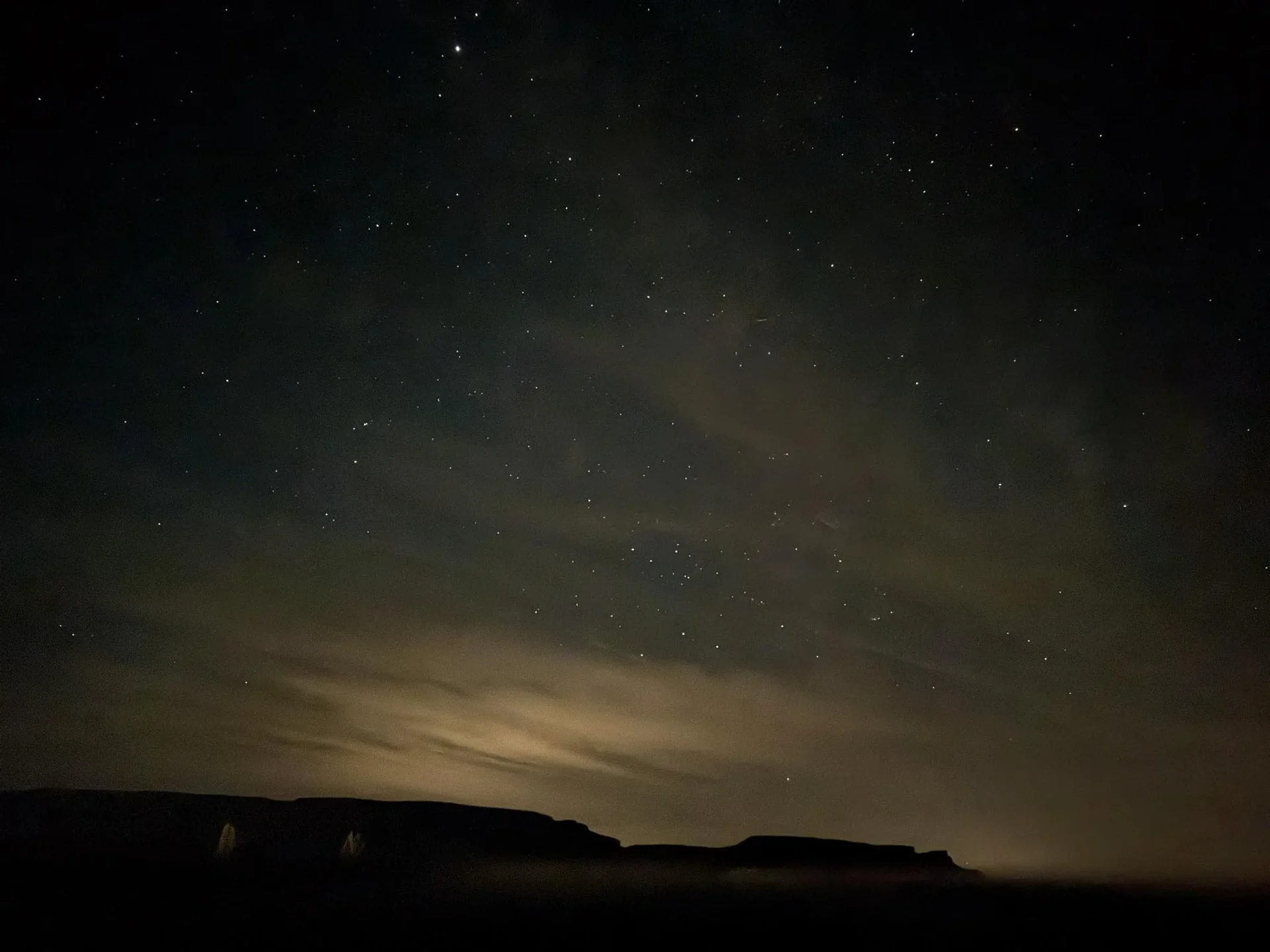 Stars peeking out over last light